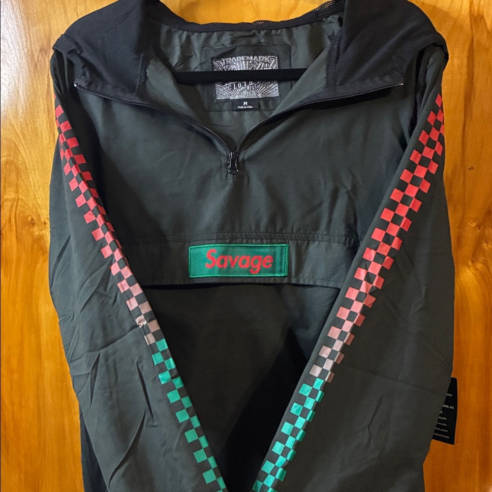 Savage Black Windbreaker with Red and Green Accents